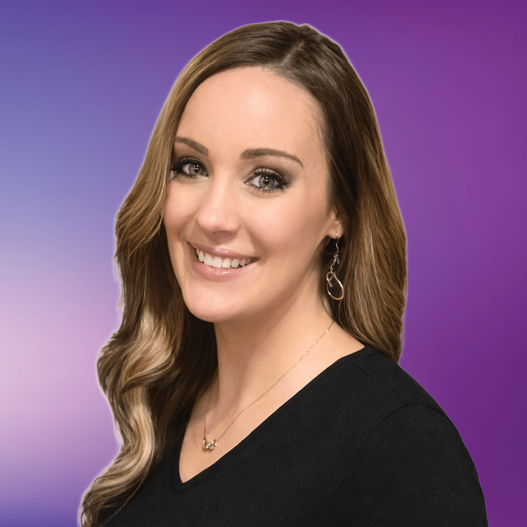 Team member Lacy smiling at the camera, photo on a purple background