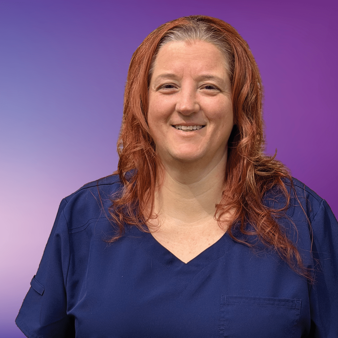Photo of team member Amanda on a purple background