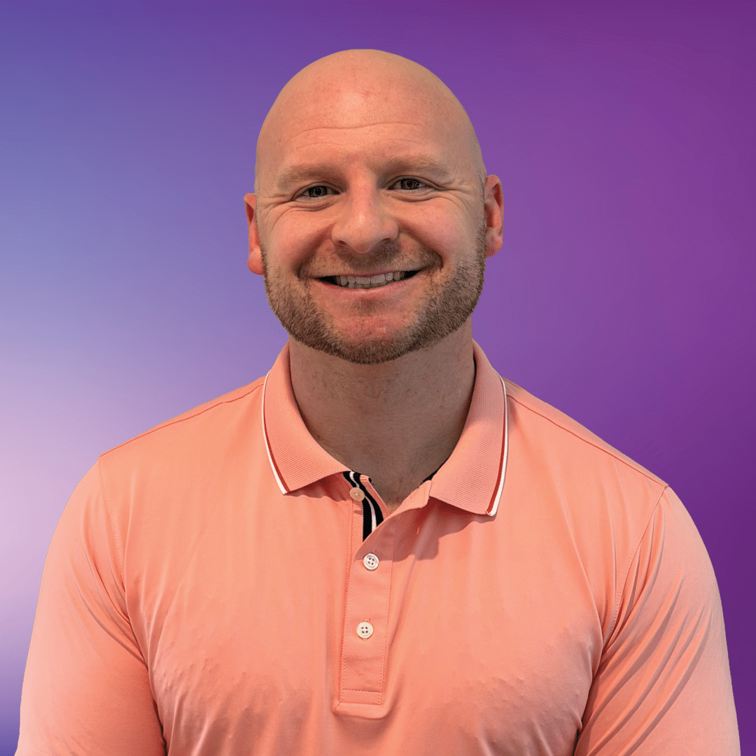 Headshot of Kyle, speech language pathologist, on a purple background