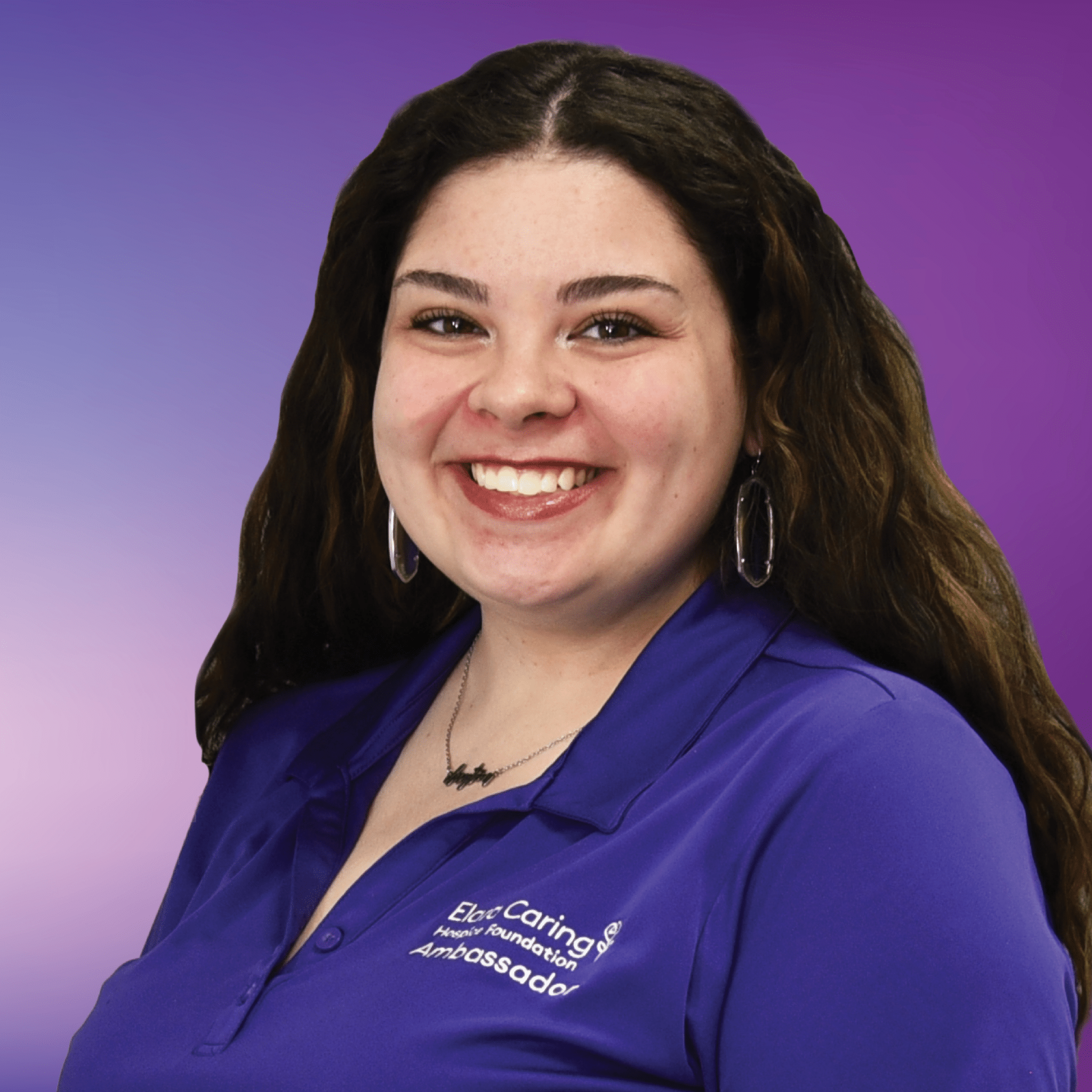 Photo of Grace, volunteer coordinator, on a purple background